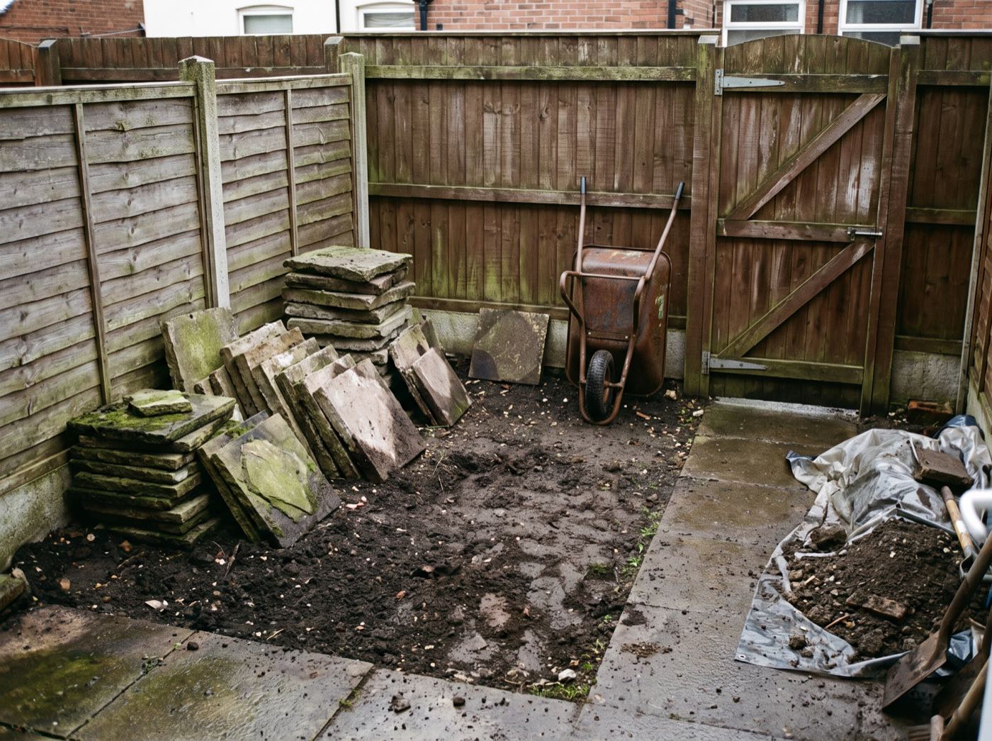 A back garden mid-renovation in Wigan (illustrative)